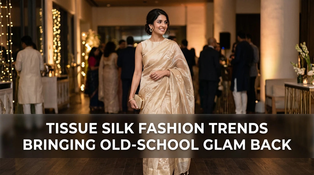 Modern Indian woman standing, wearing sheer champagne tissue silk saree and minimalist blouse.