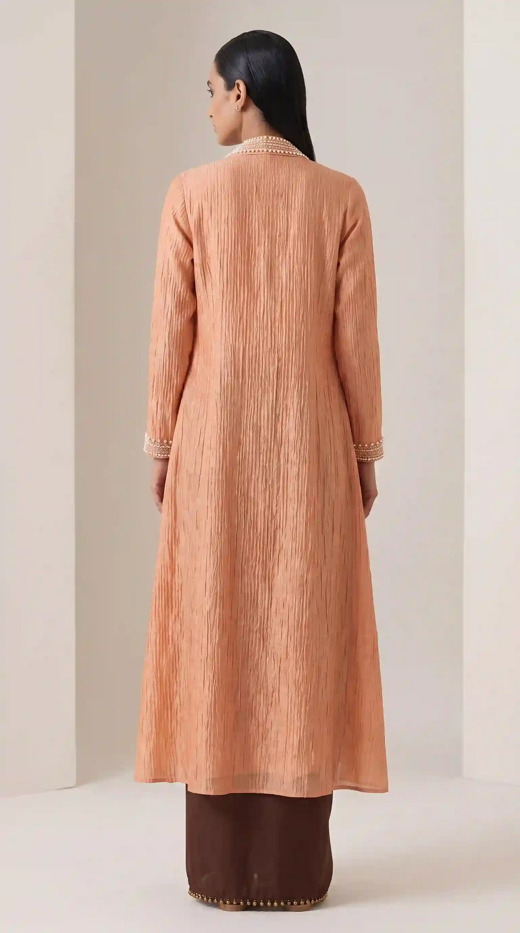 Mukta crushed tissue silk jacket and draped skirt — back view