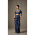 Blue denim draped skirt set with heavily hand-embroidered mirror work blouse, full front view