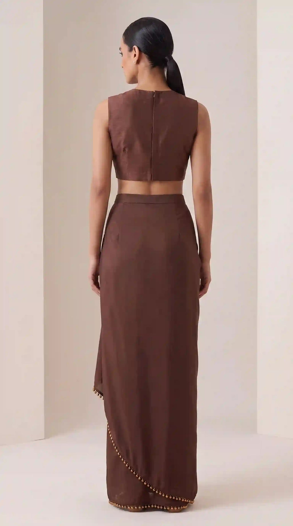 Mukta pearl work blouse and draped skirt — back view