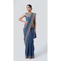 Blue cotton denim saree and sleeveless embroidered blouse with mirror work, full front view