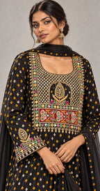 Close-up of hand-embroidered neckline and sleeve border on black bandhani modal silk — thumbnail 5