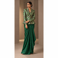ZAREEN emerald green brocade peplum blazer and draped skirt set, full front view on white square canvas