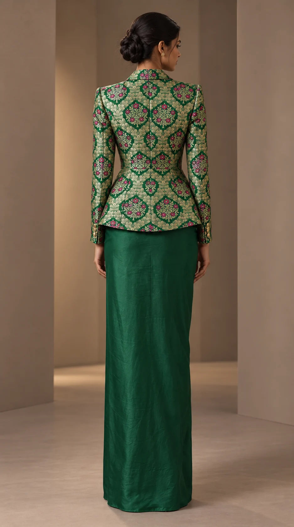 ZAREEN emerald green brocade peplum blazer and draped skirt set, back view with smooth unpleated skirt