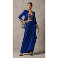 Royal Blue Banarasi Katan silk brocade three-piece set with modal silk blazer and draped skirt, full-length front with blazer; full photograph centered on a square white canvas