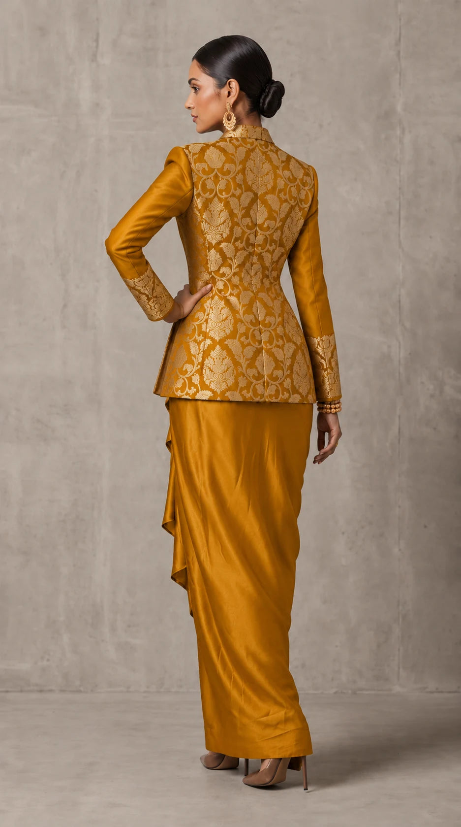 Ochre Gold Banarasi Katan silk brocade three-piece set with modal silk blazer and draped skirt, full-length back with blazer