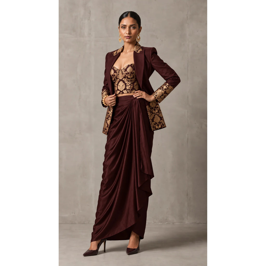 Wine Brown Banarasi Katan silk brocade three-piece set with modal silk blazer and draped skirt, full-length front with blazer; full photograph centered on a square white canvas