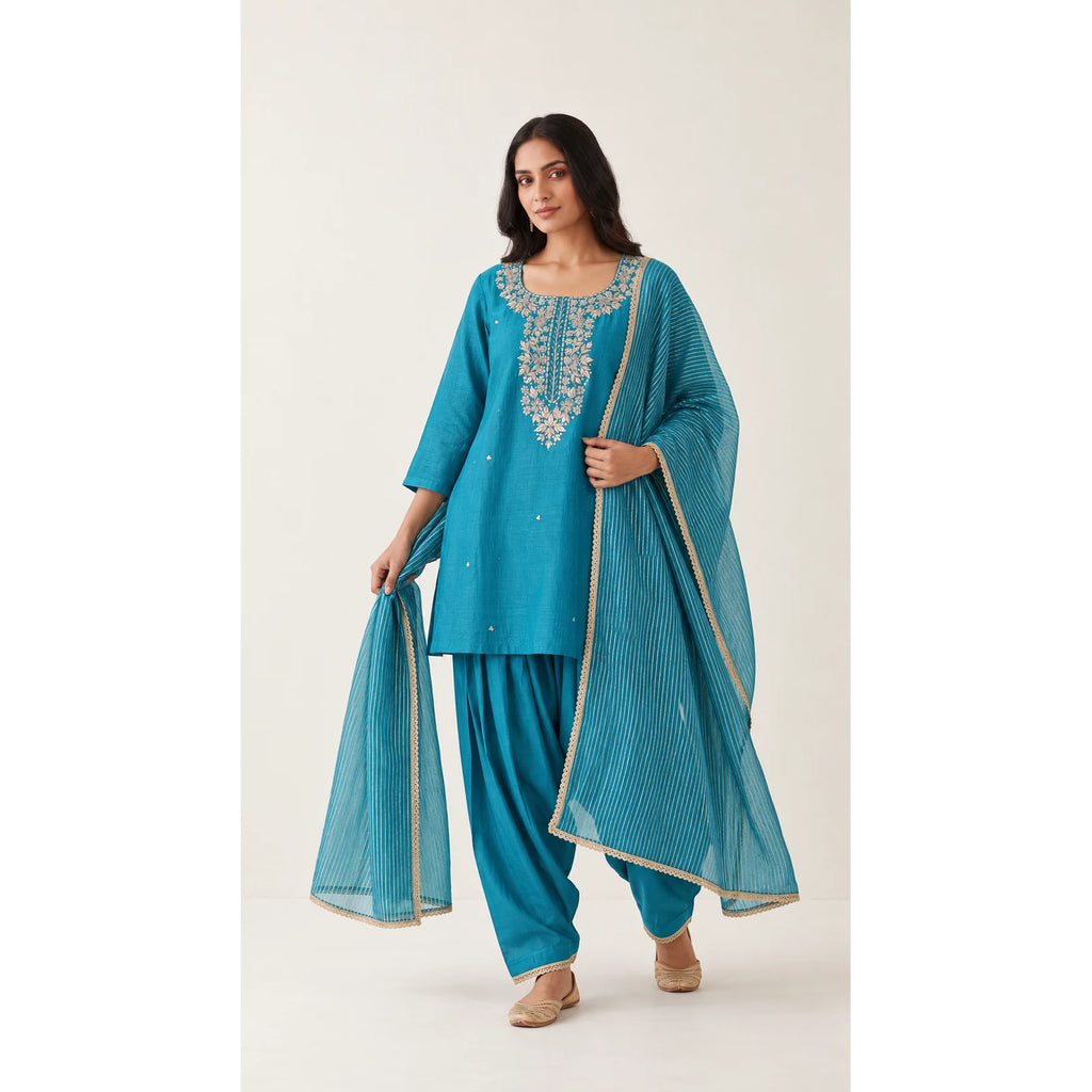 Neerja turquoise Zardosi Maheshwari silk Farshi salwar set with tissue zari-striped dupatta, front view; full photograph centered on a square white canvas