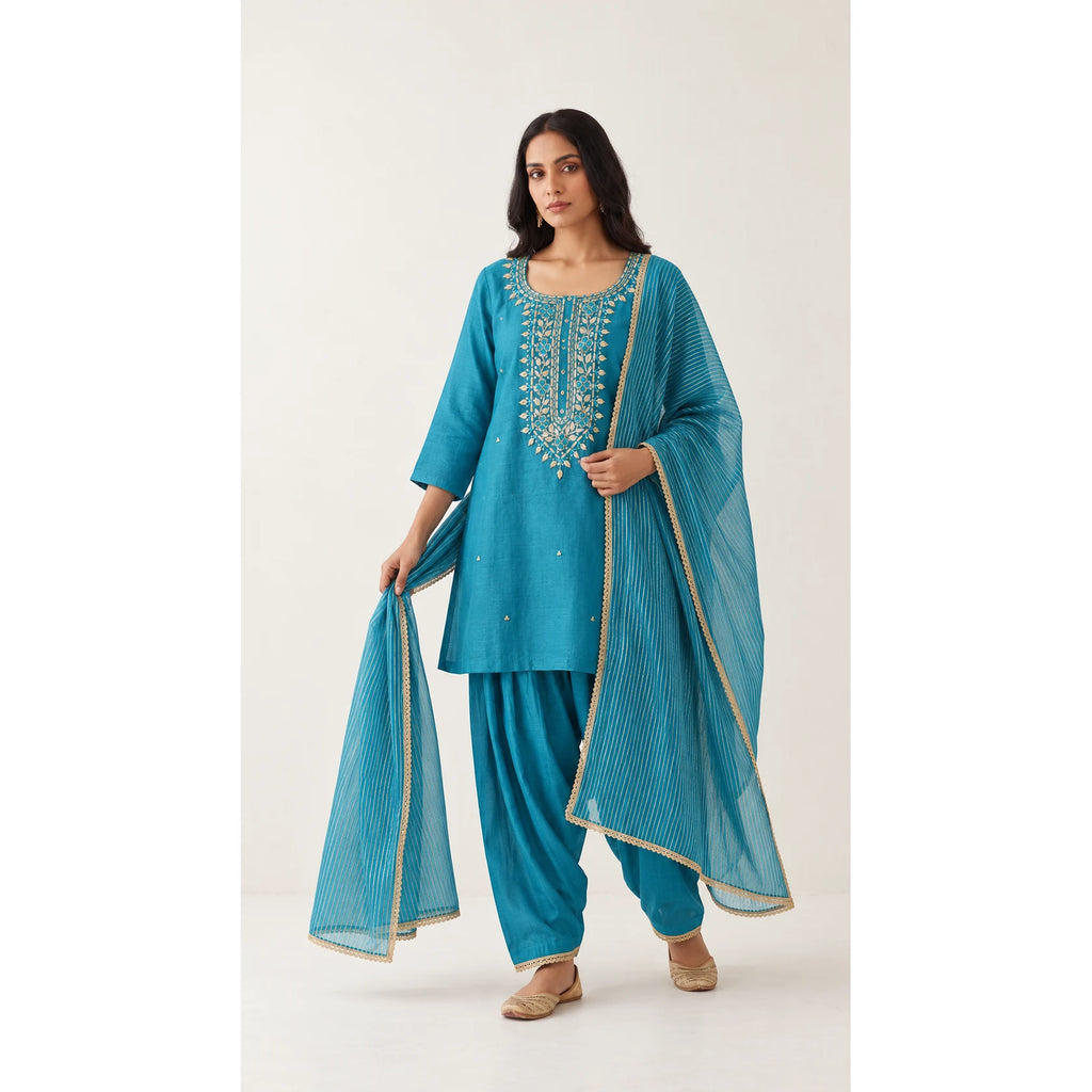 Aab turquoise blue Zardosi Maheshwari silk Farshi salwar set with tissue zari-striped dupatta, front view; full photograph centered on a square white canvas