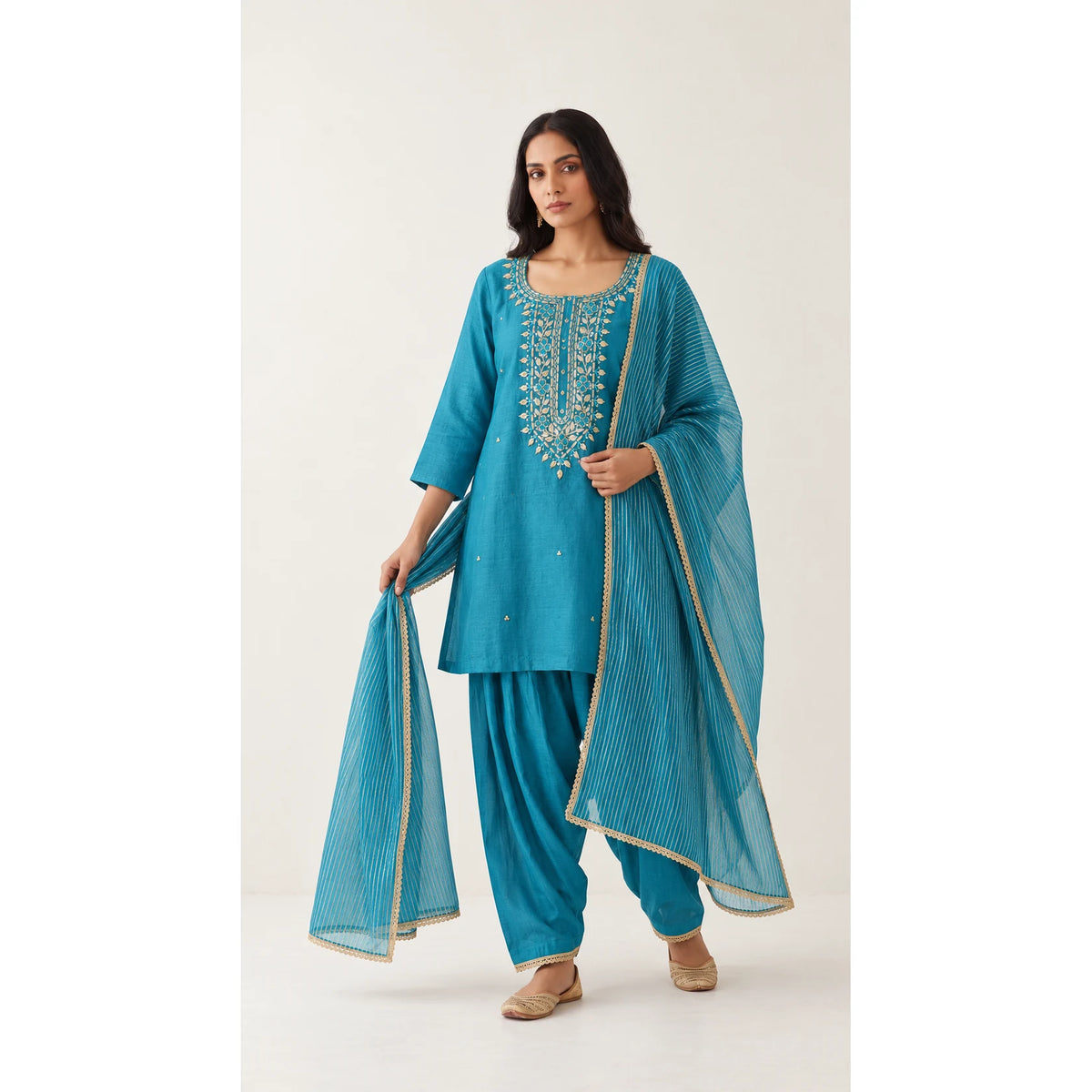 Aab turquoise blue Zardosi Maheshwari silk Farshi salwar set with tissue zari-striped dupatta, front view; full photograph centered on a square white canvas