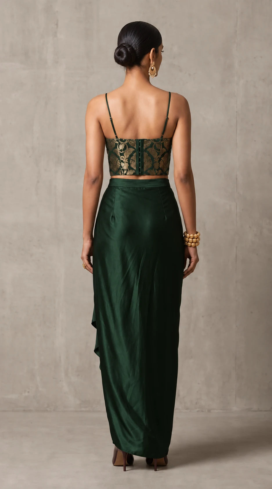 Deep Green Banarasi Katan silk brocade three-piece set with modal silk blazer and draped skirt, back view without blazer