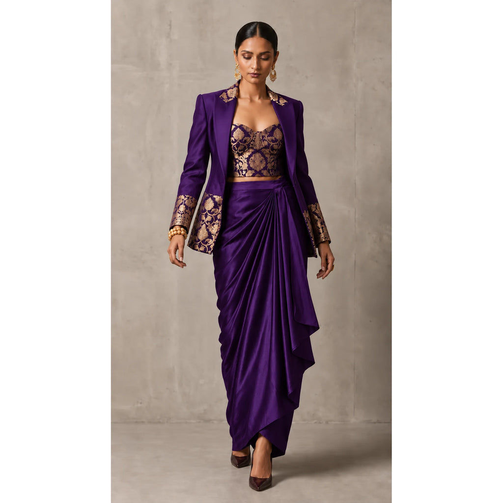 Purple Banarasi Katan silk brocade three-piece set with modal silk blazer and draped skirt, full-length front with blazer; full photograph centered on a square white canvas