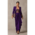 Purple Banarasi Katan silk brocade three-piece set with modal silk blazer and draped skirt, full-length front with blazer; full photograph centered on a square white canvas