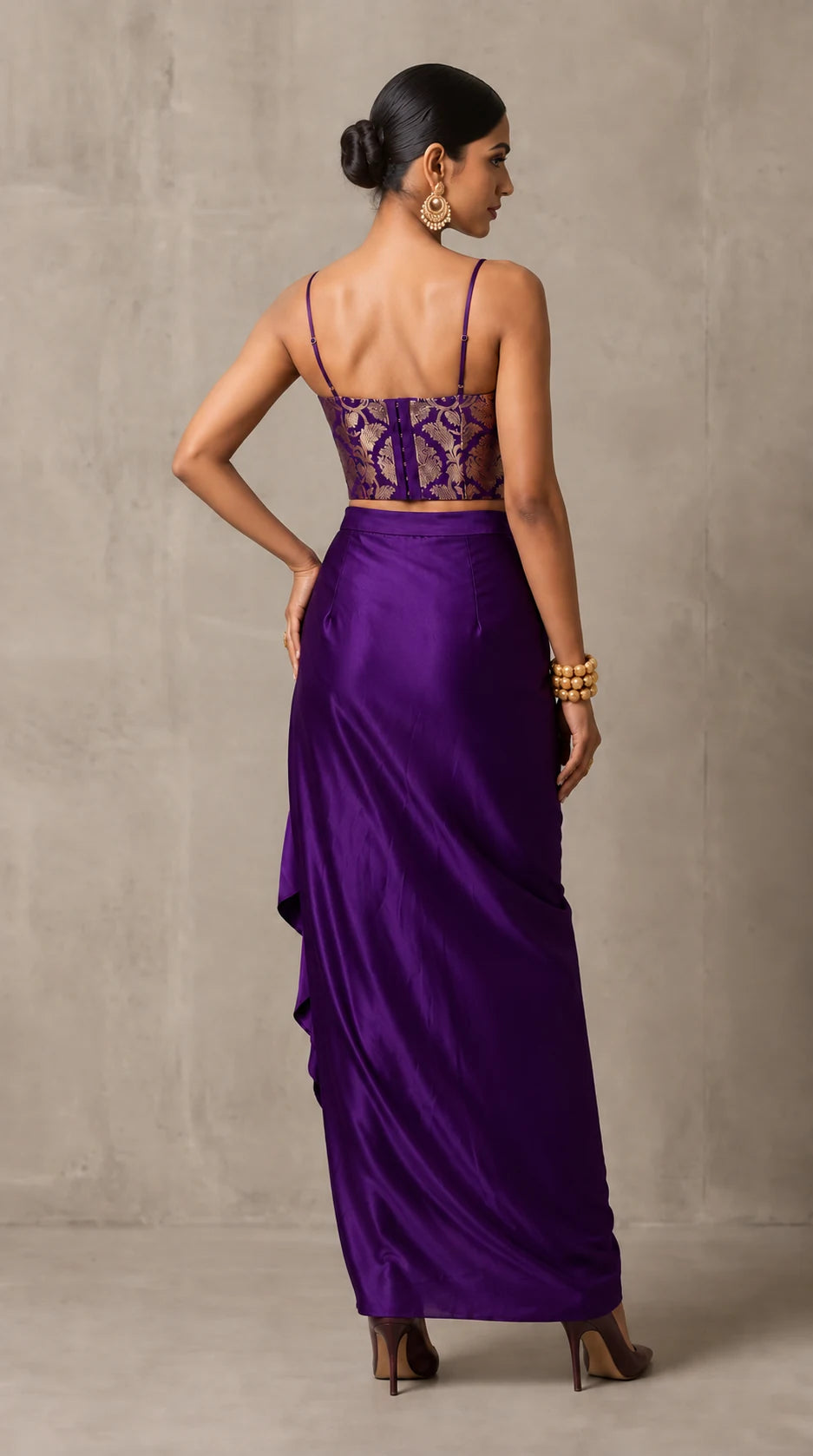 Purple Banarasi Katan silk brocade three-piece set with modal silk blazer and draped skirt, back view without blazer